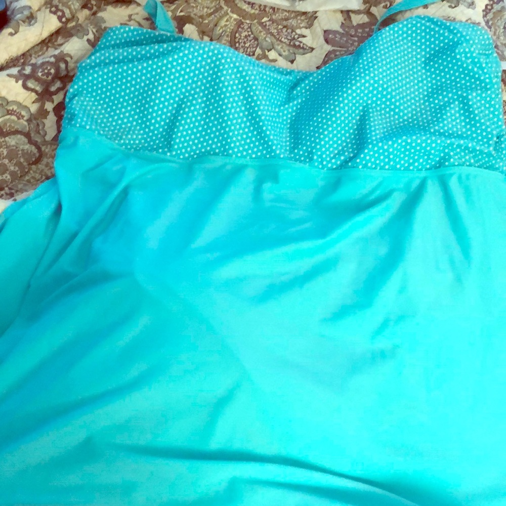 A turquoise one piece size 28